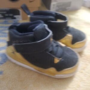 Jordan Kids Black and Gold Sneakers